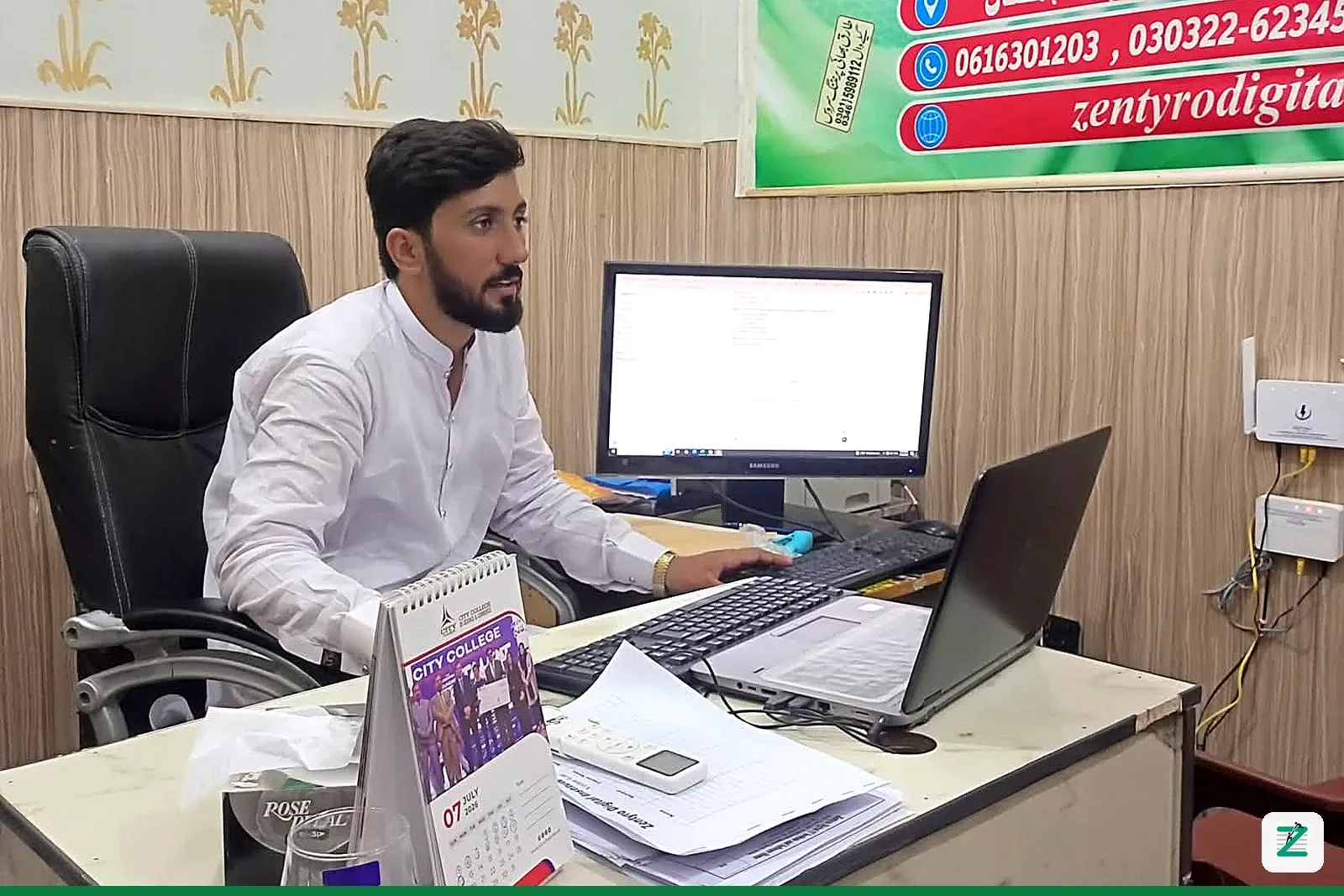 Inside the Zentyro Digital head office in Multan, with the institute's courses banner on the wall